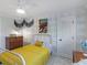 Comfortable bedroom with stylish furniture and unique wall decor at 2270 Emerald Dr, Jonesboro, GA 30236