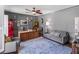 Comfortable home office features a desk, sofa, Coca-cola machine and unique decor at 2270 Emerald Dr, Jonesboro, GA 30236