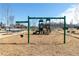 Community playground featuring swings, slides, and benches for Gathering fun and relaxation at 624 Devon Aly, Acworth, GA 30102