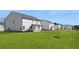 Wide-open backyard with green grass perfect for outdoor enjoyment at 712 Curb Ct, Locust Grove, GA 30248