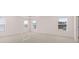 Spacious main bedroom with neutral carpet, lots of light and ceiling fan at 712 Curb Ct, Locust Grove, GA 30248