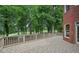 Spacious back deck with tile flooring, overlooking a lush green landscape and golf course view at 8250 Saint Marlo Fairway Dr, Duluth, GA 30097