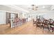 Entertain in this spacious open floor plan offering a wet bar and large formal dining area at 8250 Saint Marlo Fairway Dr, Duluth, GA 30097