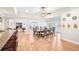 Bright dining area with a full bar and recessed lighting is perfect for hosting and entertaining at 8250 Saint Marlo Fairway Dr, Duluth, GA 30097
