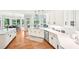 Eat in kitchen with large windows, quartz countertops and stainless steel appliances at 8250 Saint Marlo Fairway Dr, Duluth, GA 30097