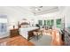 Main bedroom suite with tray ceiling, sitting area and en-suite bathroom at 8250 Saint Marlo Fairway Dr, Duluth, GA 30097