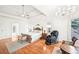 Spacious primary suite with hardwood floors, sitting area and tray ceilings at 8250 Saint Marlo Fairway Dr, Duluth, GA 30097