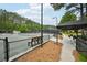 Tennis courts with benches and covered areas for relaxing at 8250 Saint Marlo Fairway Dr, Duluth, GA 30097