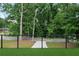 Artificial turf patio with modern steel railing and view of quiet street at 1604 Niskey Lake Rd, Atlanta, GA 30331