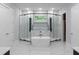 Luxury bathroom with a freestanding tub and a frameless glass shower enclosure at 1604 Niskey Lake Rd, Atlanta, GA 30331