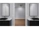Modern bathroom featuring dual vanities with black sinks and quartz countertops, and view to bedroom at 1604 Niskey Lake Rd, Atlanta, GA 30331