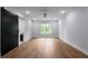 Expansive bedroom with hardwood floors, natural light, and modern ceiling fan at 1604 Niskey Lake Rd, Atlanta, GA 30331