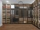 Spacious walk-in closet with custom shelving and lighting, providing ample storage for clothes and accessories at 1604 Niskey Lake Rd, Atlanta, GA 30331