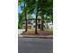 Modern two-story home with a manicured front yard and modern garage door at 1604 Niskey Lake Rd, Atlanta, GA 30331