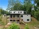 Modern two-story home featuring a spacious deck, and a contemporary design at 1604 Niskey Lake Rd, Atlanta, GA 30331