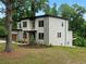 Modern two-story home with stone accents, and a private balcony at 1604 Niskey Lake Rd, Atlanta, GA 30331