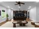 Modern kitchen with sleek black island, counter seating, and hardwood floors offers a stylish and functional space at 1604 Niskey Lake Rd, Atlanta, GA 30331
