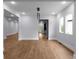 Open-concept living room with hardwood floors, recessed lights, and neutral paint at 1604 Niskey Lake Rd, Atlanta, GA 30331
