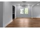 Hardwood floors and plenty of natural light in this spacious room at 1604 Niskey Lake Rd, Atlanta, GA 30331