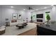 Spacious living room with modern furniture, fireplace, and large windows offers a comfortable and stylish space at 1604 Niskey Lake Rd, Atlanta, GA 30331