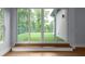 Bright room featuring sliding doors to an outdoor patio with artificial grass at 1604 Niskey Lake Rd, Atlanta, GA 30331