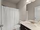 Bathroom featuring a single vanity with a white countertop, toilet and bathtub with shower at 3317 Sweetleaf Ln, Buford, GA 30519
