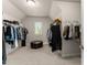 Organized walk-in closet providing ample storage space with rods and shelves, and natural light at 3317 Sweetleaf Ln, Buford, GA 30519