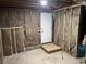 Unfinished basement with exposed insulation, concrete floor, and walk-out access at 743 San Fernando Se Dr, Smyrna, GA 30080