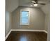 Bright bedroom with hardwood floors, fresh paint, and a large window offering natural light at 743 San Fernando Se Dr, Smyrna, GA 30080