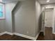 Cozy bedroom featuring hardwood floors, neutral walls, and white trim at 743 San Fernando Se Dr, Smyrna, GA 30080