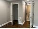 Bedroom featuring access to a modern barn door bathroom and a closet with an open door at 743 San Fernando Se Dr, Smyrna, GA 30080