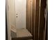 Stairway leading to unfinished basement with exposed wall studs at 1978 Winding Creek Sw Ln, Marietta, GA 30064