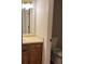 View of neutral bathroom vanity and toilet from an open doorway at 1978 Winding Creek Sw Ln, Marietta, GA 30064