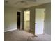 Bedroom features neutral walls, carpet flooring, and 2 closets at 1978 Winding Creek Sw Ln, Marietta, GA 30064