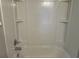 A clean white shower and tub combo at 1978 Winding Creek Sw Ln, Marietta, GA 30064