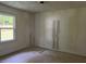 Bedroom offers a bright window and neutral walls, ready for customization and personal design at 3831 Dillard St, Powder Springs, GA 30127
