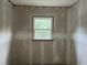Bedroom offers a bright window and neutral walls, ready for customization and personal design at 3831 Dillard St, Powder Springs, GA 30127