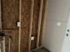 Exposed interior wall showing the studs, wiring, and plumbing for a room undergoing renovations at 3831 Dillard St, Powder Springs, GA 30127