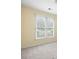 Bedroom featuring carpet, neutral paint, and window with natural light at 4801 Devonhurst Way, Powder Springs, GA 30127