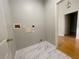 The laundry room has elegant marble floors and easy access to the home at 4801 Devonhurst Way, Powder Springs, GA 30127