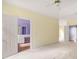 Spacious main bedroom showcasing a door to the ensuite bathroom at 4801 Devonhurst Way, Powder Springs, GA 30127