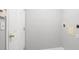 Neutral utility room with white door and grey walls at 4801 Devonhurst Way, Powder Springs, GA 30127