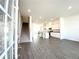 Open-concept home featuring durable floors, recessed lighting and a modern kitchen at 741 Cordele Ln, Sugar Hill, GA 30518