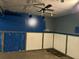 Unfinished basement shows ceiling fan, track lighting and unfinished walls at 816 Cedar Lake Se Dr, Conyers, GA 30094