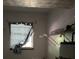 Unfinished basement features a window with a curtain and exposed ductwork at 816 Cedar Lake Se Dr, Conyers, GA 30094