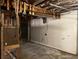 Unfinished basement with exposed beam ceiling offering ample room and lots of opportunity at 816 Cedar Lake Se Dr, Conyers, GA 30094