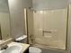 Bathroom with shower, toilet, sink, and mirror at 816 Cedar Lake Se Dr, Conyers, GA 30094