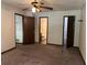 Bedroom view featuring ceiling fan, closet and connecting bathroom at 816 Cedar Lake Se Dr, Conyers, GA 30094