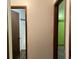 Hallway with doors leading to a bathroom and bedroom at 816 Cedar Lake Se Dr, Conyers, GA 30094