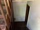 Stairway view featuring wood steps, wood railing, and walls at 816 Cedar Lake Se Dr, Conyers, GA 30094